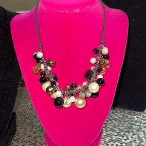 Beautiful beaded necklace with suede cord